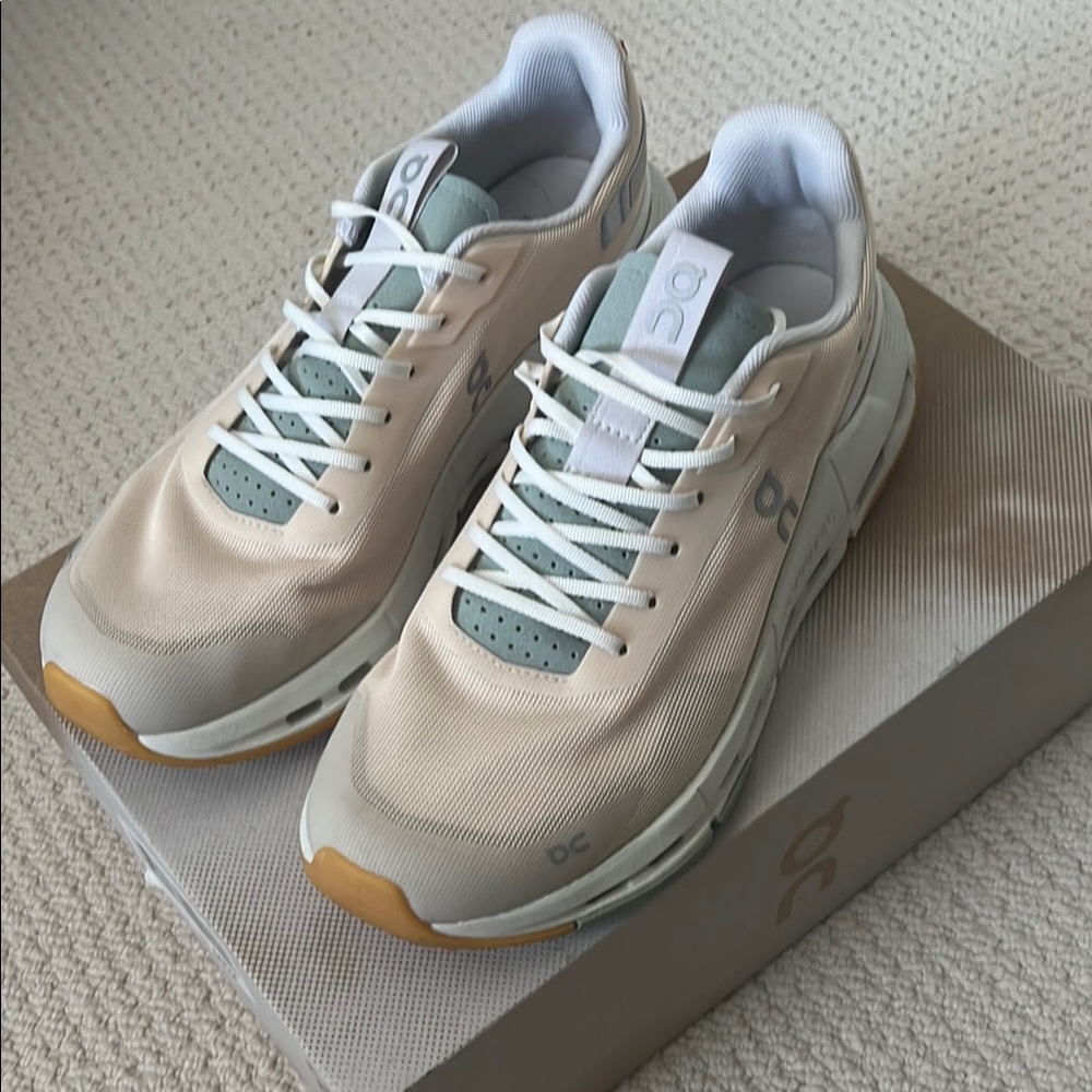 On Running Women’s Cream and Gray Sneakers